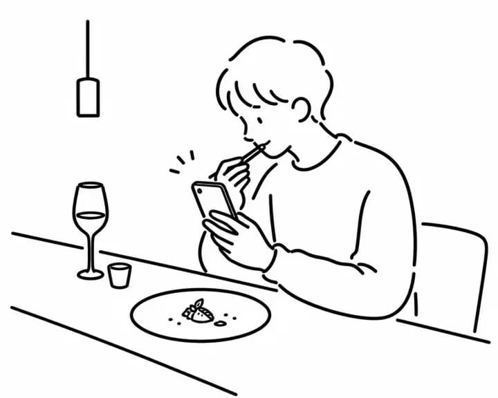 食事中にスマホでメモを取るイラスト